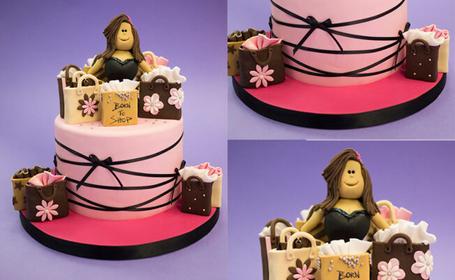 Picture of female fitness models on cake