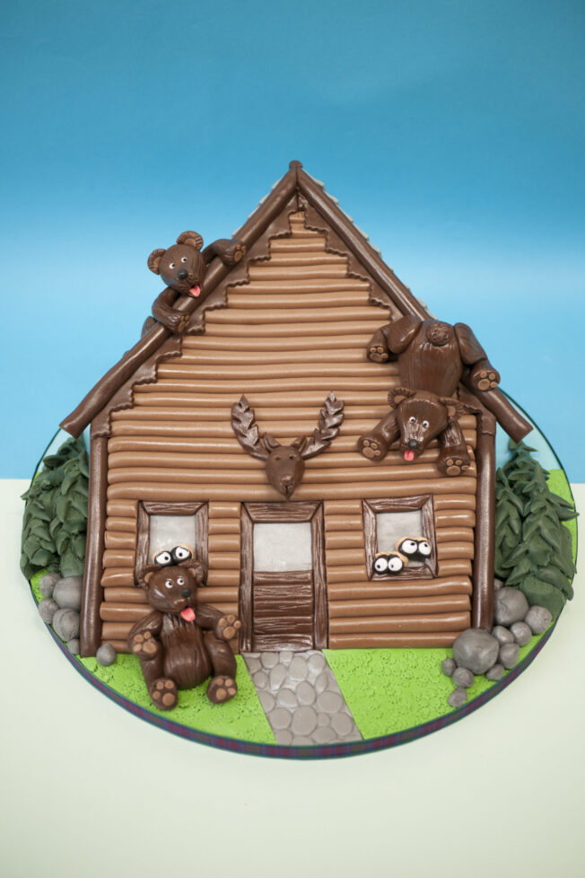 Log Cabin cake decorating tutorial on CakeFlix