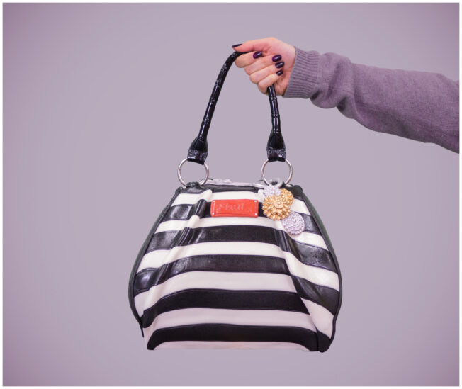 handbag cake suspended