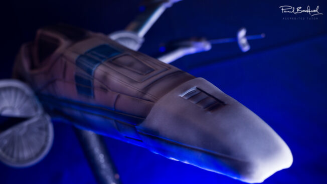 Close up of space jet fighter cake