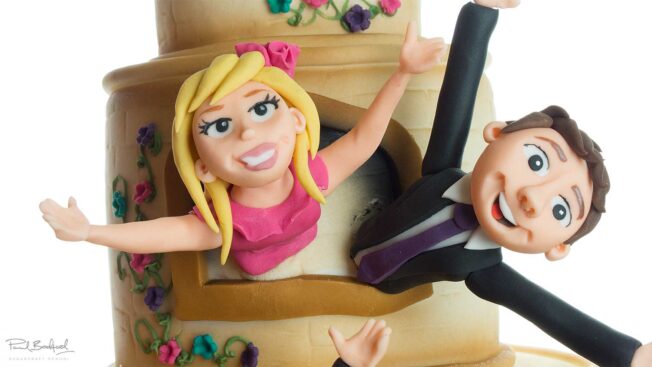 Close up of sugarpaste guests bridal party cake