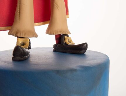 Close up of shoes of Captain Bradley armture cake