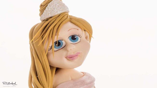 Close up of blushing princess cake face