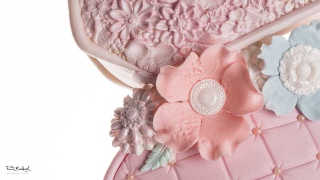 Close up of flower on handbag heaven cake