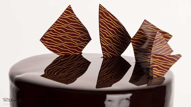 Chocolate cake covered in mirror glaze