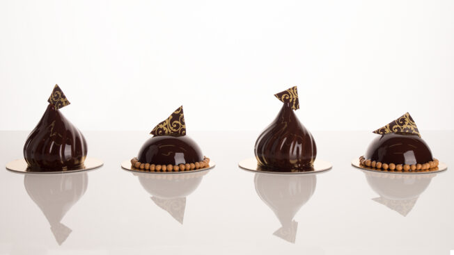 Chocolate mousse covered in mirror glaze made by Helen Vass