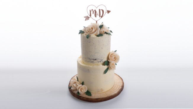 naked buttercream wedding cake