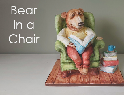 bear in a chair