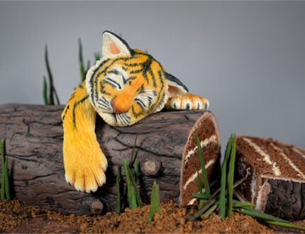 Sleepy tiger cub cut cake