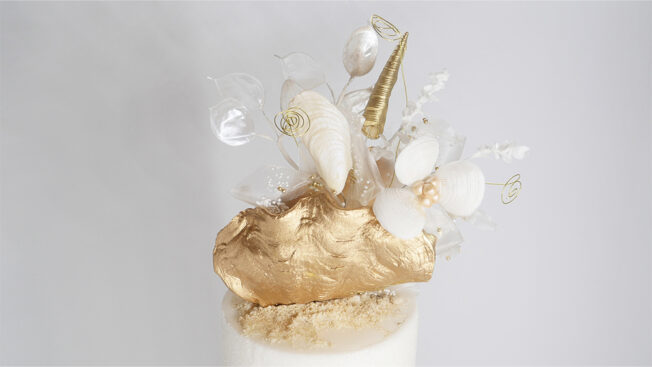 Golden beach wedding cake top tier