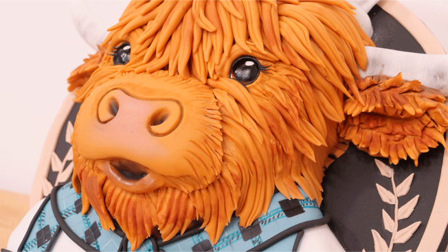 The Kilted Baker Highland Cow cake