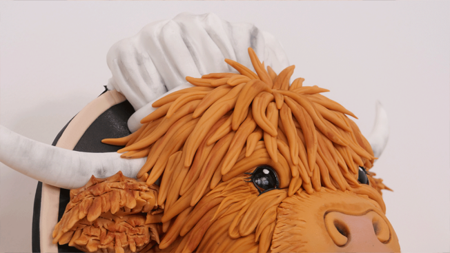 The Kilted Baker Highland Cow cake